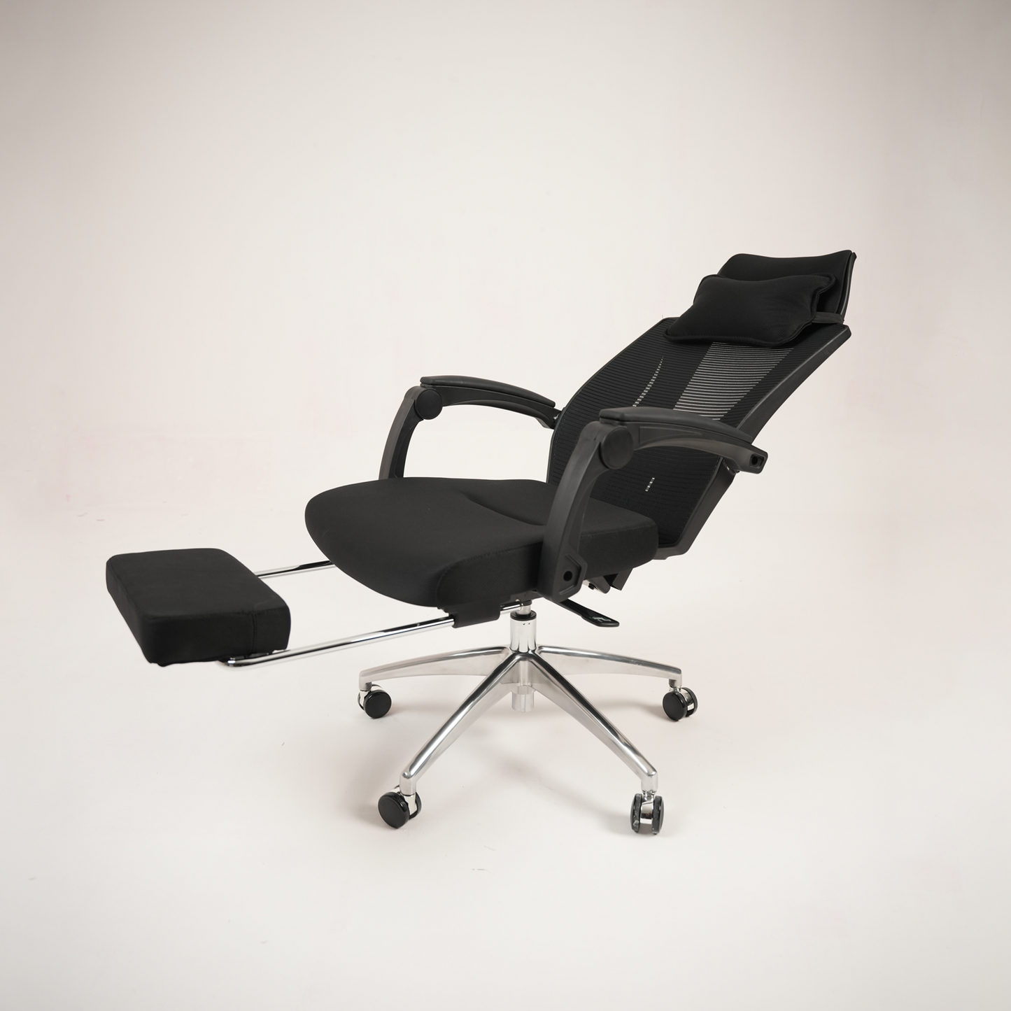 Ergonomic Black High-Back Mesh Office Chair with Headrest, Footrest and Chrome Base